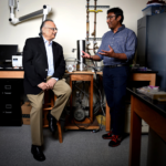 University Distinguished Professor of physics Arun Bansil (left) and associate professor of physics Swastik Kar accidentally discovered a new way to manipulate electronic charge. Photo by Matthew Modoono/Northeastern University