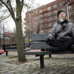 Lobsang Tseten meditates and practices breathing exercises alone to maintain “social distancing” at a playground on Wednesday, March 25, 2020, in New York. AP Photo/John Minchillo