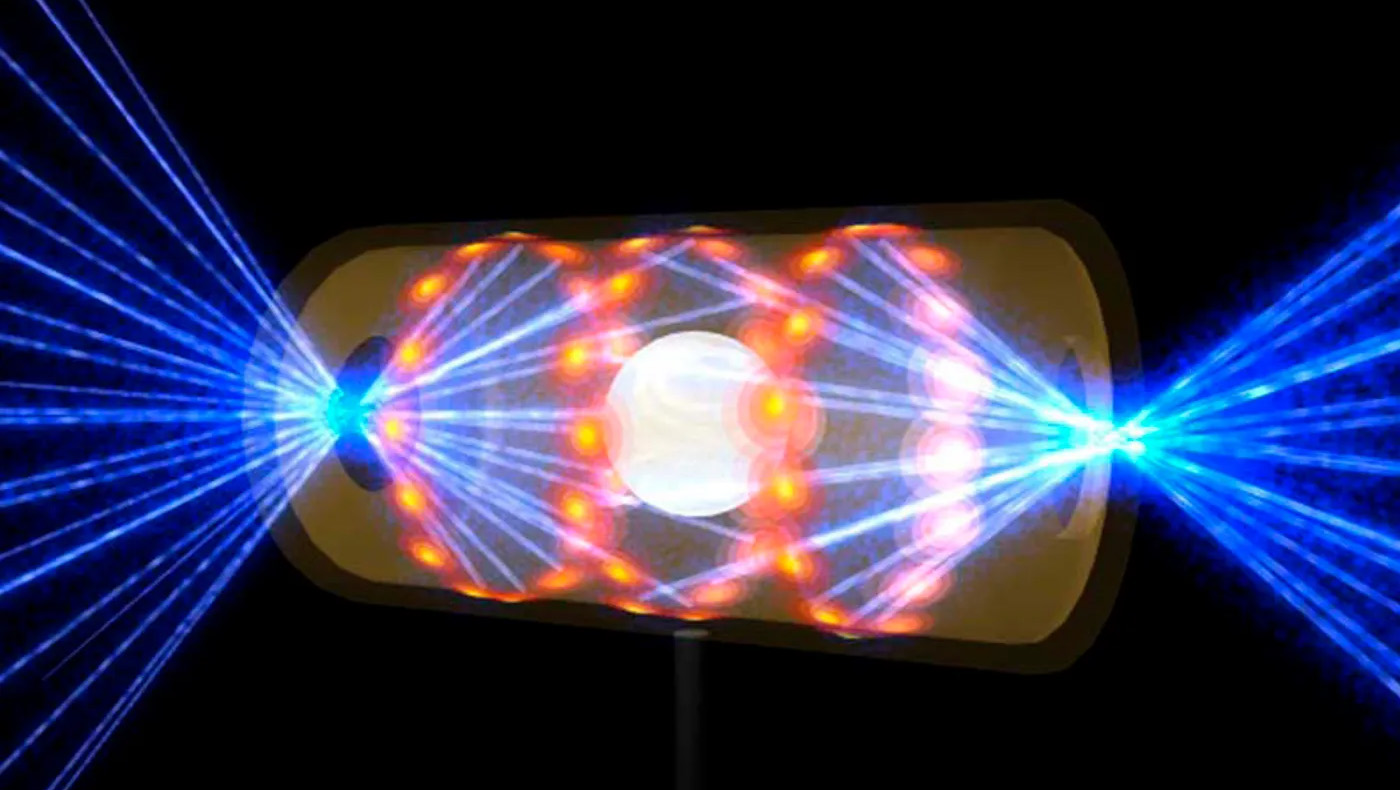 This illustration provided by the National Ignition Facility at the Lawrence Livermore National Laboratory depicts a target pellet inside a hohlraum capsule with laser beams entering through openings on either end. The beams compress and heat the target to the necessary conditions for nuclear fusion to occur.