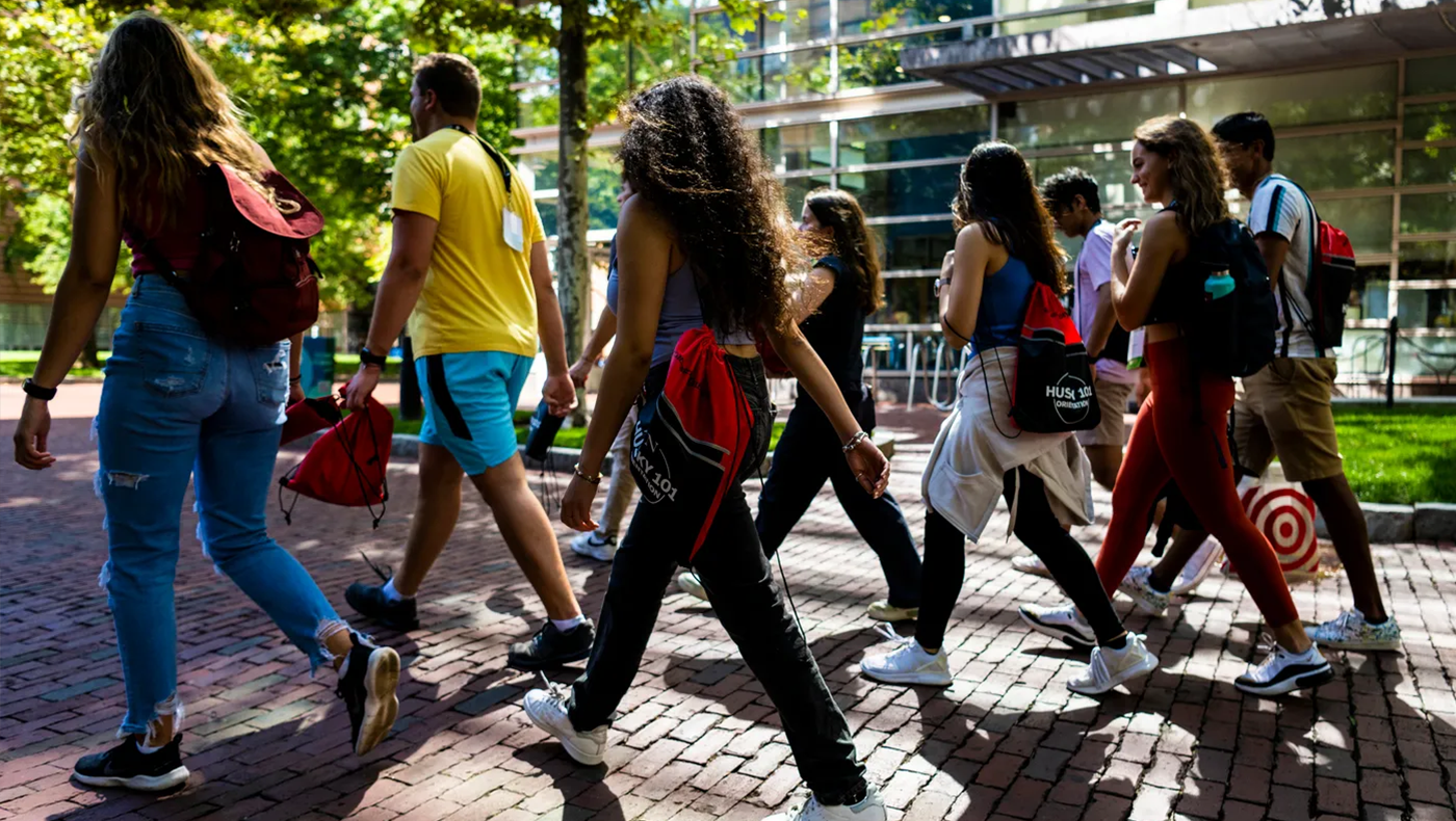 Northeastern University students walking on campus.