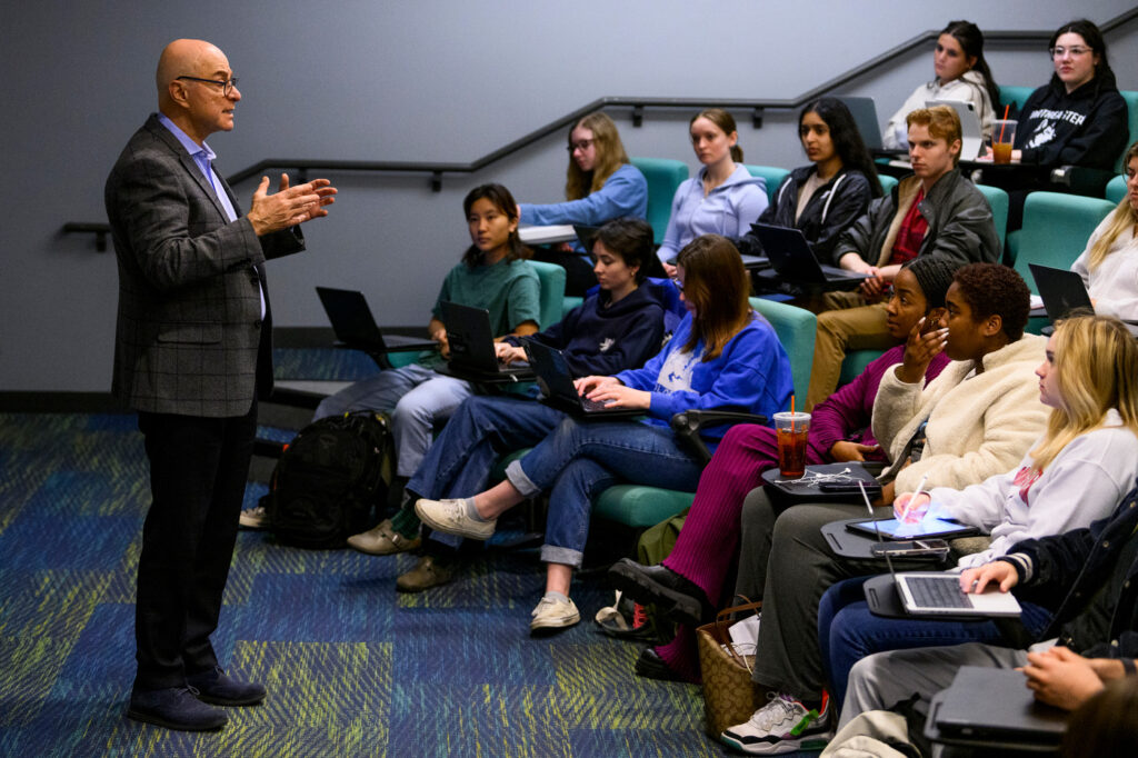 Northeastern University president guest lectures a psychology course