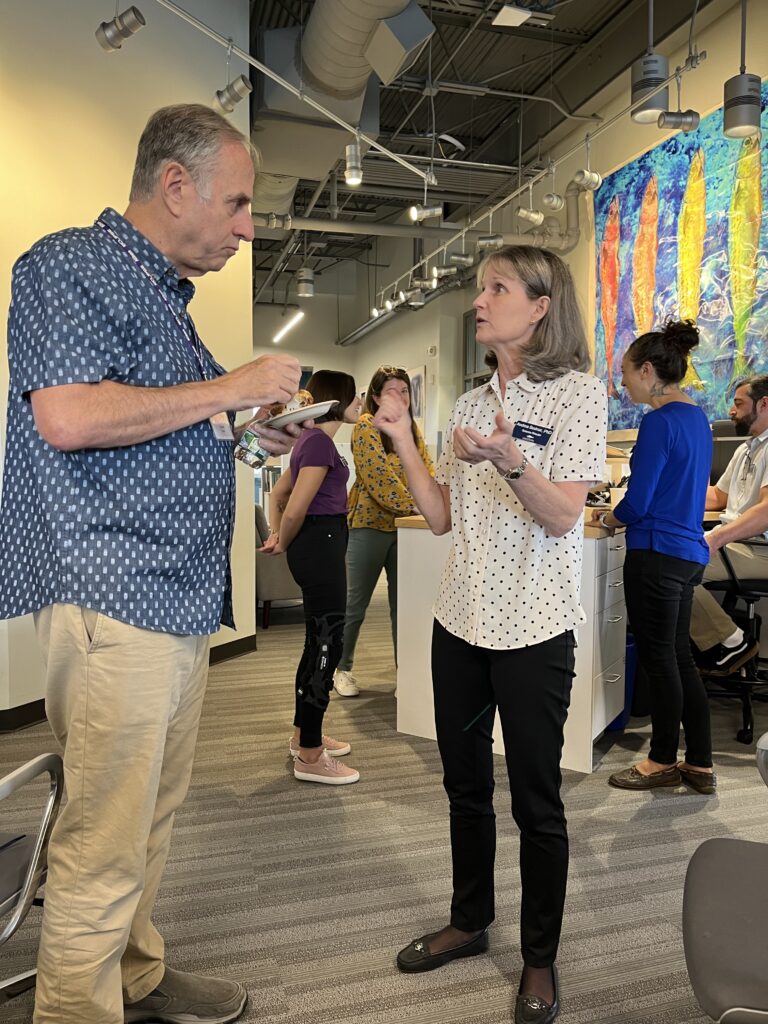 Dan Distel, Ocean Genome Legacy Center Director and MSC/CSI Research Professor, chats with GMGI Science Director Andrea Bodnar during a break between planning sessions. 