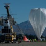 SuperBIT preparing for the launch of its first science flight in April 2023. The flight lasted 40 days, in which the telescope circled Antarctica five times at over 100,000 feet.