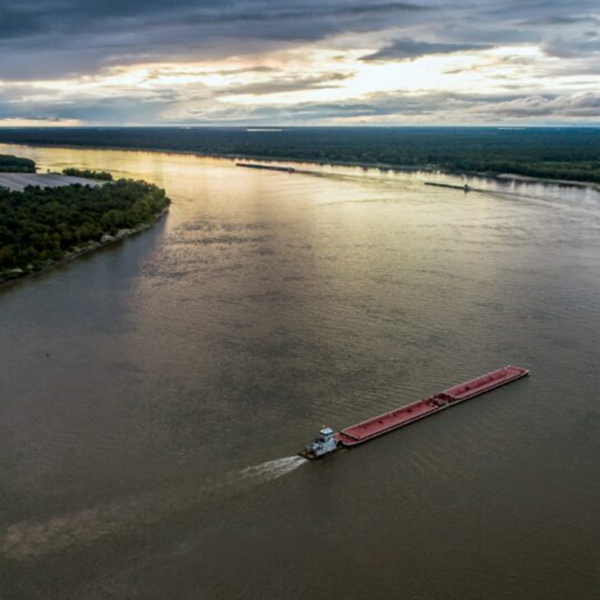 A boat travels down the Mississippi River.